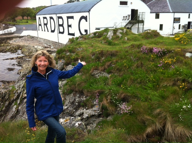The Dam Pub's owners Stephanie Price standing outside a whisky distillery in Scotland