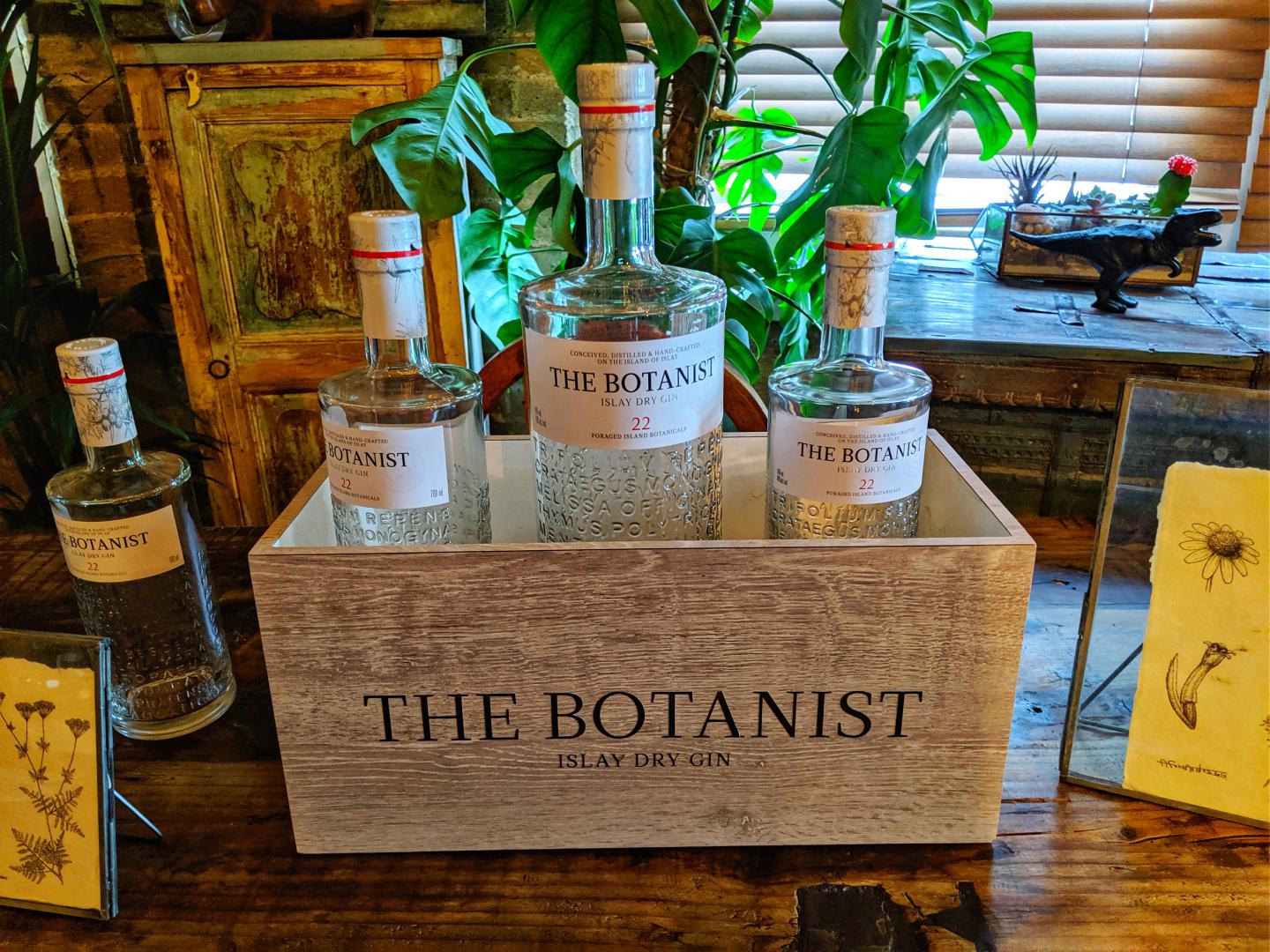 Botanist Gin shown on table in cocktail bar